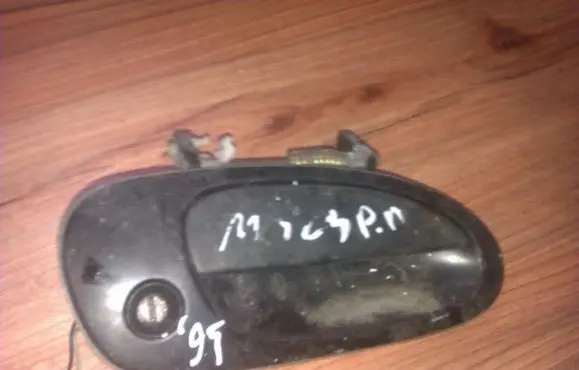 Mazda 323 Front door exterior handle