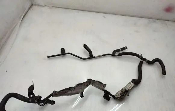 Volkswagen Golf VII Engine coolant pipe/hose 5Q0121064AG 04L121070D
