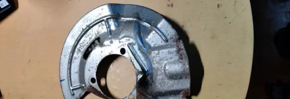Chevrolet Malibu Front brake disc dust cover plate 23377439