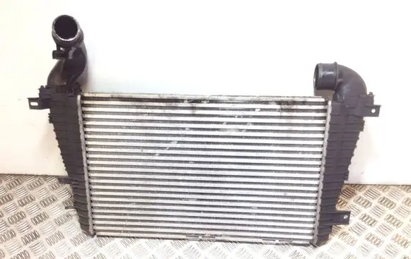 Opel Zafira B Intercooler radiator 13223395