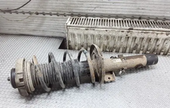 Audi A2 Front shock absorber with coil spring