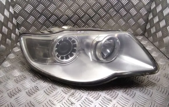 Volkswagen Touareg I Headlight/headlamp 7L6941032 7L6941040