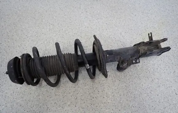 KIA Venga Front shock absorber with coil spring 