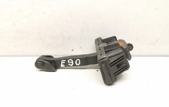 Front door check strap stopper
