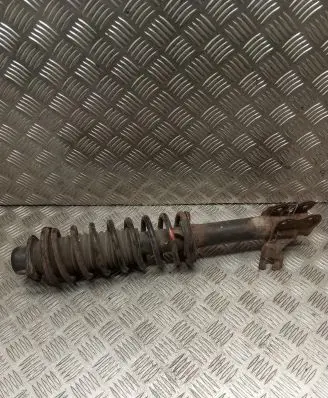 Nissan Micra Front shock absorber with coil spring
