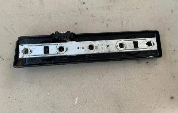 Mercedes-Benz W123 Tail light bulb cover holder 22061R