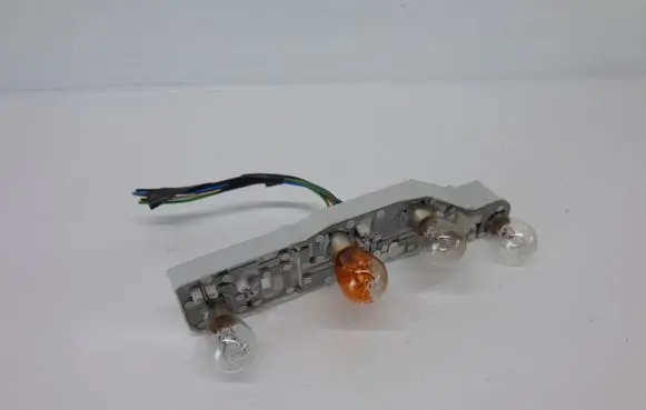Ford Focus Tail light bulb cover holder 13N005