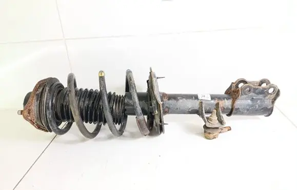 Front shock absorber with coil spring