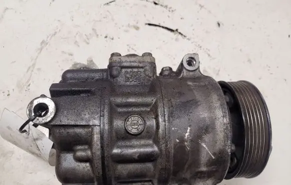 Volkswagen Golf VI Air conditioning (A/C) compressor (pump) 1K0820859F 04006027B4