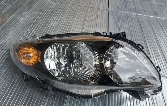 Toyota Corolla E140 E150 Headlight/headlamp TYC20699390 8111002680