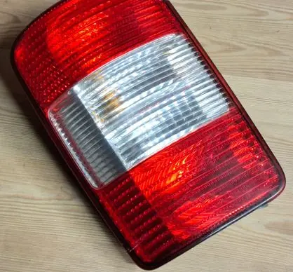 Volkswagen Caddy Rear/tail lights 2K0945112A