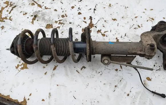 Ford Connect Front shock absorber with coil spring 