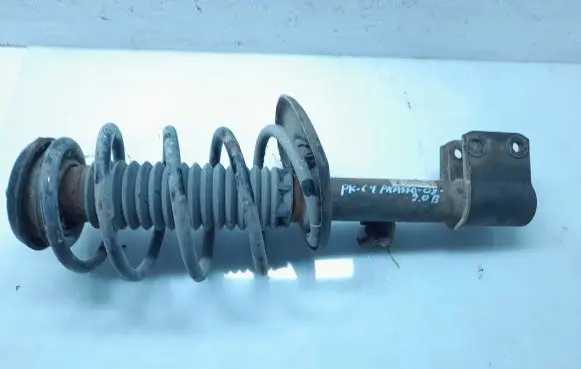Front shock absorber with coil spring