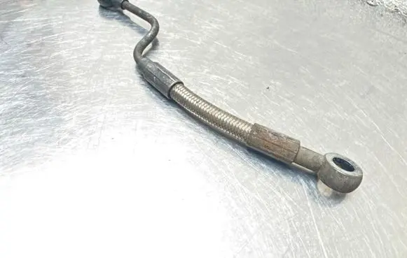 Opel Astra H Turbo turbocharger oiling pipe/hose 55201945