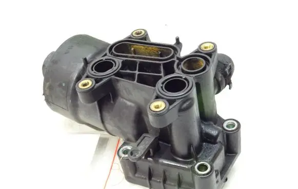 Volkswagen PASSAT B7 Oil filter mounting bracket 03L115389G