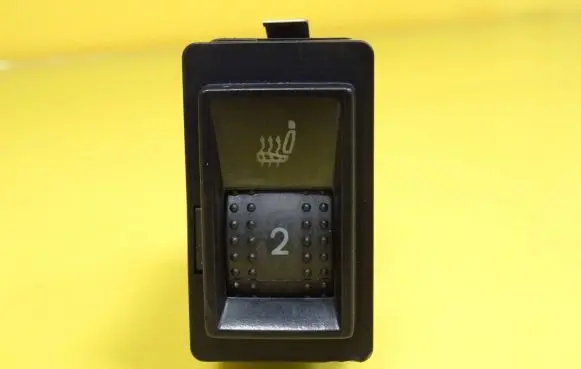 Seat heating switch