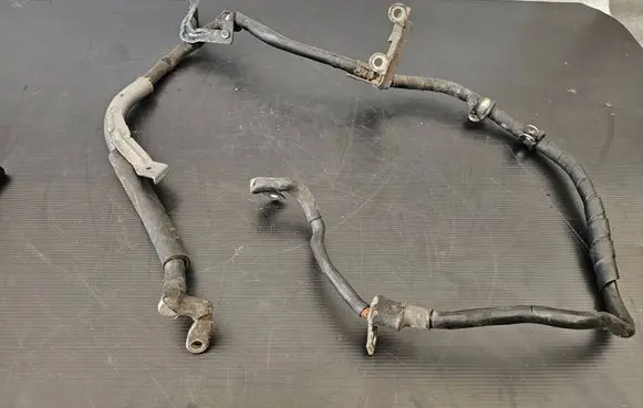 Volkswagen Touareg I Negative earth cable (battery)