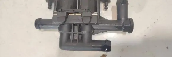 Coolant heater control valve