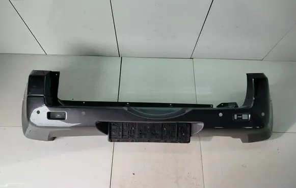 Suzuki Grand Vitara II Rear bumper 7181165J10