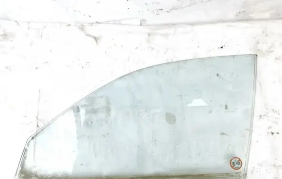 Mazda 121 Front door window glass four-door