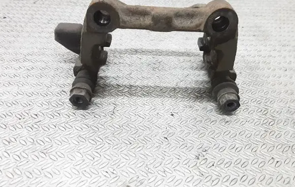 Volkswagen Touran I Brake caliper pad carrier rear 
