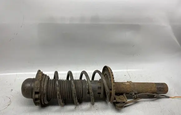Audi A2 Front shock absorber with coil spring
