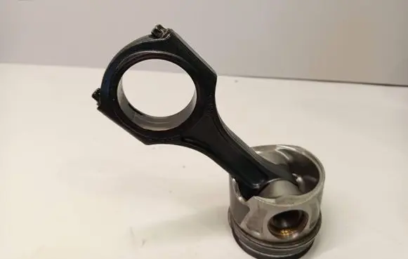 Piston with connecting rod
