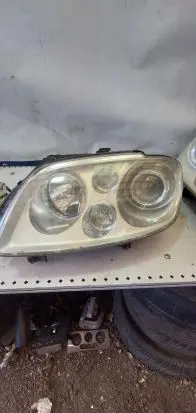 Volkswagen Touran I Headlight/headlamp 305235779 305235777