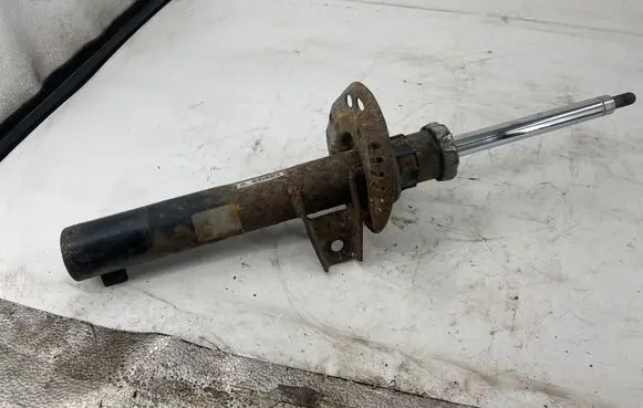 Volkswagen Golf V Front shock absorber/damper 1K0413031BE