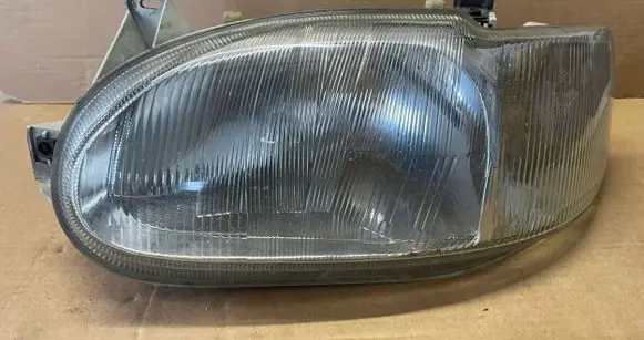 Ford Escort Headlight/headlamp 038150
