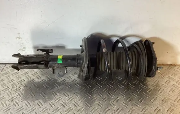 Front shock absorber with coil spring