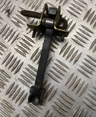 Rear door check strap stopper