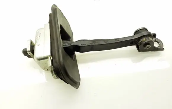 Front door check strap stopper