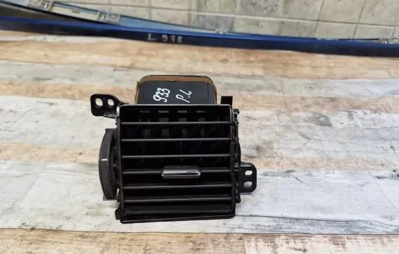Dash center air vent grill