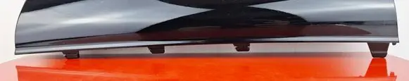 Rear bumper trim bar molding
