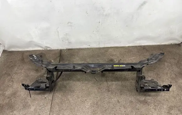 Top upper radiator support slam panel
