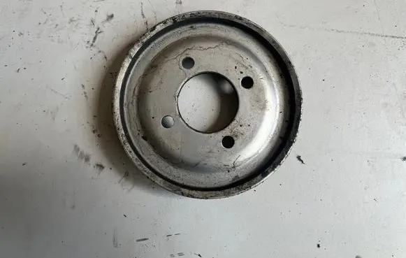 Renault Megane I Water pump pulley 7700864701