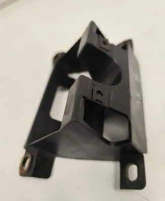 Volkswagen Touareg I Headlight washer nozzle holder 7L6807361