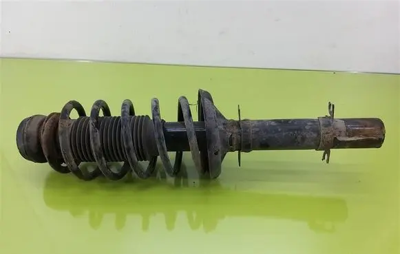 Volkswagen Bora Front shock absorber with coil spring 334812