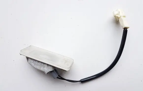 Subaru Tribeca Number plate light A047588 E130675 SAEL00D0T