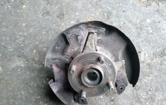 Mazda 323 F Front wheel hub spindle knuckle