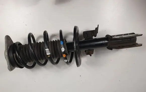 Front shock absorber with coil spring
