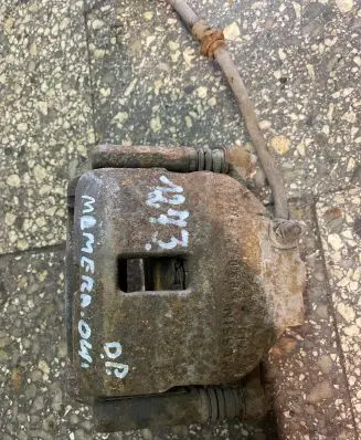 Nissan Almera N16 Front brake caliper