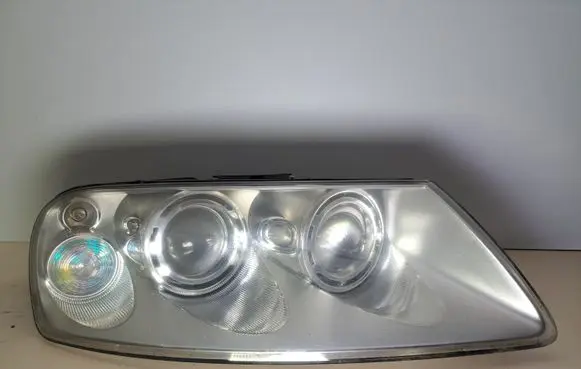 Volkswagen Touareg I Headlight/headlamp 7L6941016BB 89307861