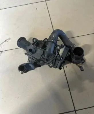 Thermostat/thermostat housing