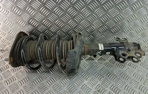 Toyota Corolla E210 E21 Front shock absorber with coil spring
