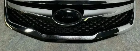 Subaru Legacy Front bumper upper radiator grill 91121AJ001 120327
