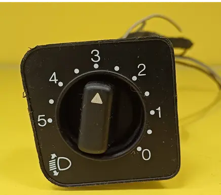 Headlight level height control switch