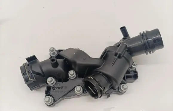 Thermostat/thermostat housing