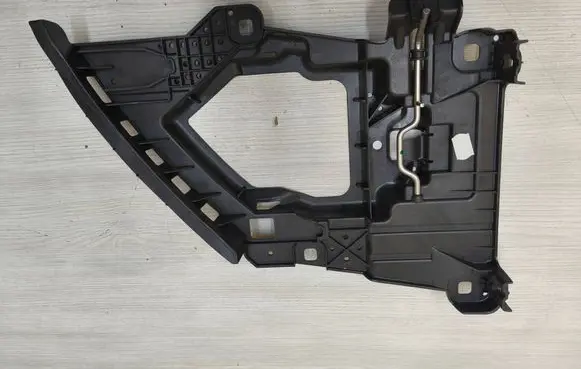 Porsche Cayenne (92A) Headlight/headlamp mounting bracket 7P5941045B